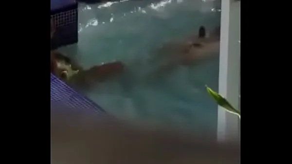 Nová from San Pedro de Macoris swimming in the pool čerstvá trubica