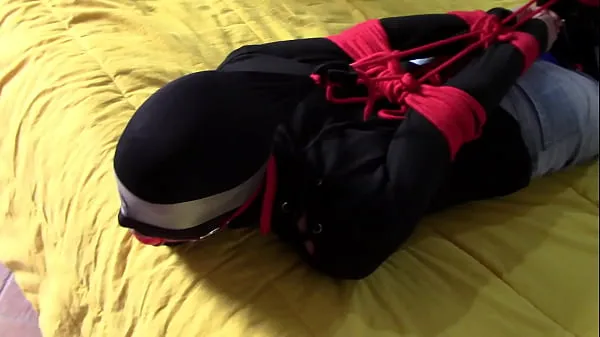 Laura XXX is wearing panthyhose and high heels. She's hogtied, masked, blindfolded and ballgagged أنبوب جديد جديد