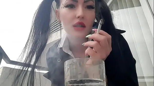Smoking fetish. Dominatrix Nika smokes sexy and spits into a glass. Imagine that this glass is your mouth, and you are just an ashtray for Mistress Tube baru yang baru