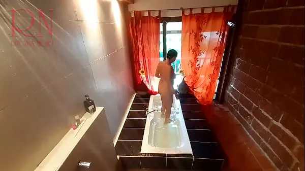 Peep. Voyeur. Housewife washes in the shower with soap, shaves her pussy in the bath. 2 1 Tiub baharu baharu